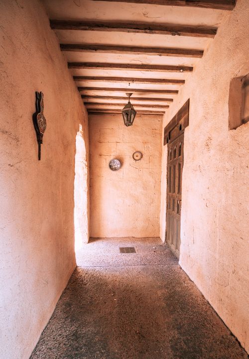 Free Authentic Moroccan-style corridor in Bay Lake, Florida, featuring rustic architecture and warm tones. Stock Photo