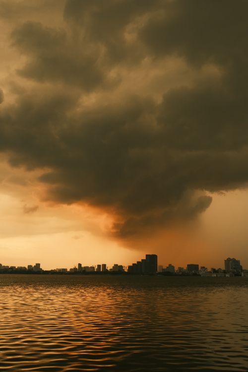 Free Dramatic storm clouds with a sunset over Tokyo skyline, Japan. Stock Photo