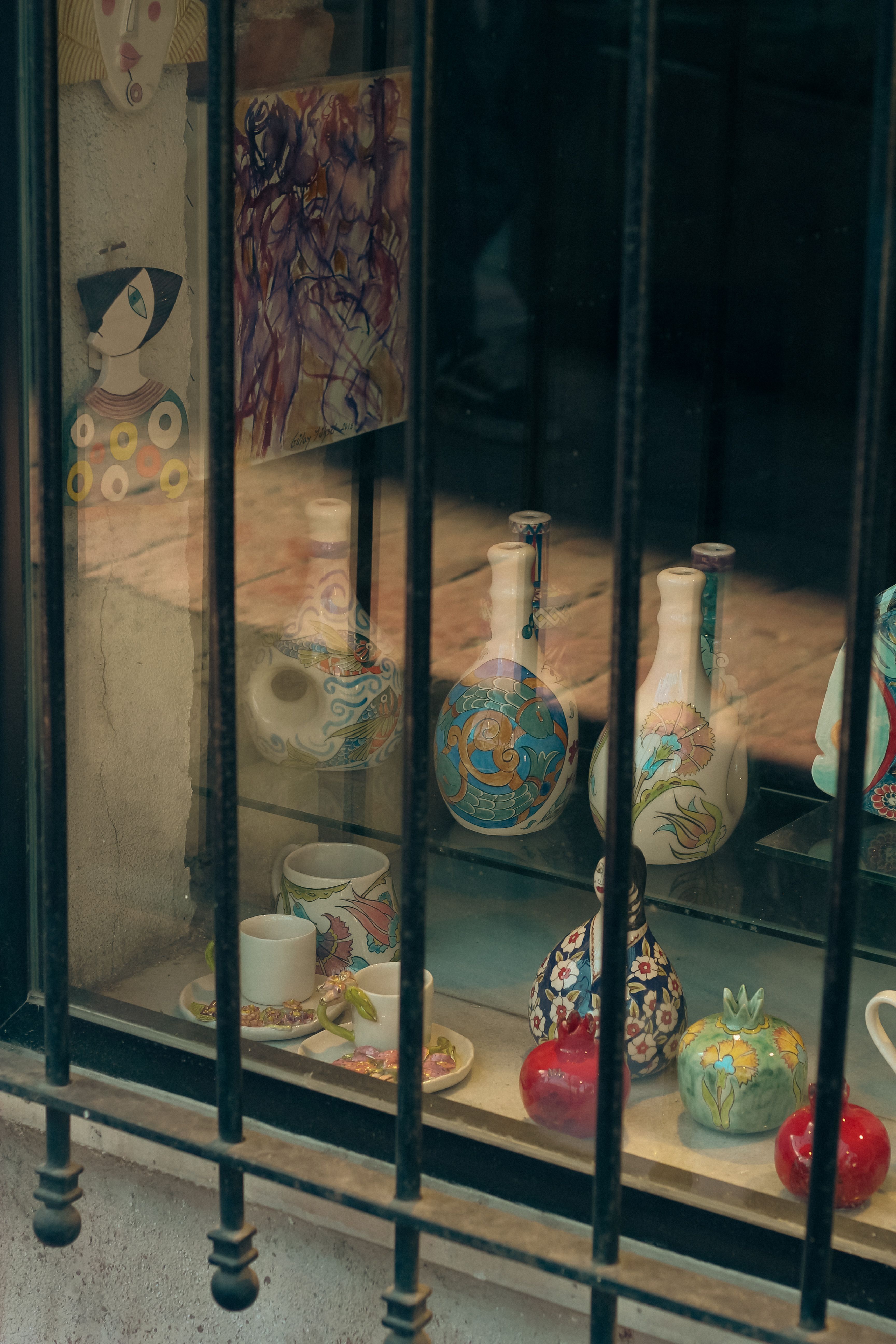 Cozy Shop Window with Colorful Pottery Display · Free Stock Photo
