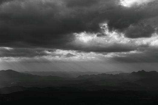 Moody black and white photo of cloudy mountains in Minas Gerais, Brazil.