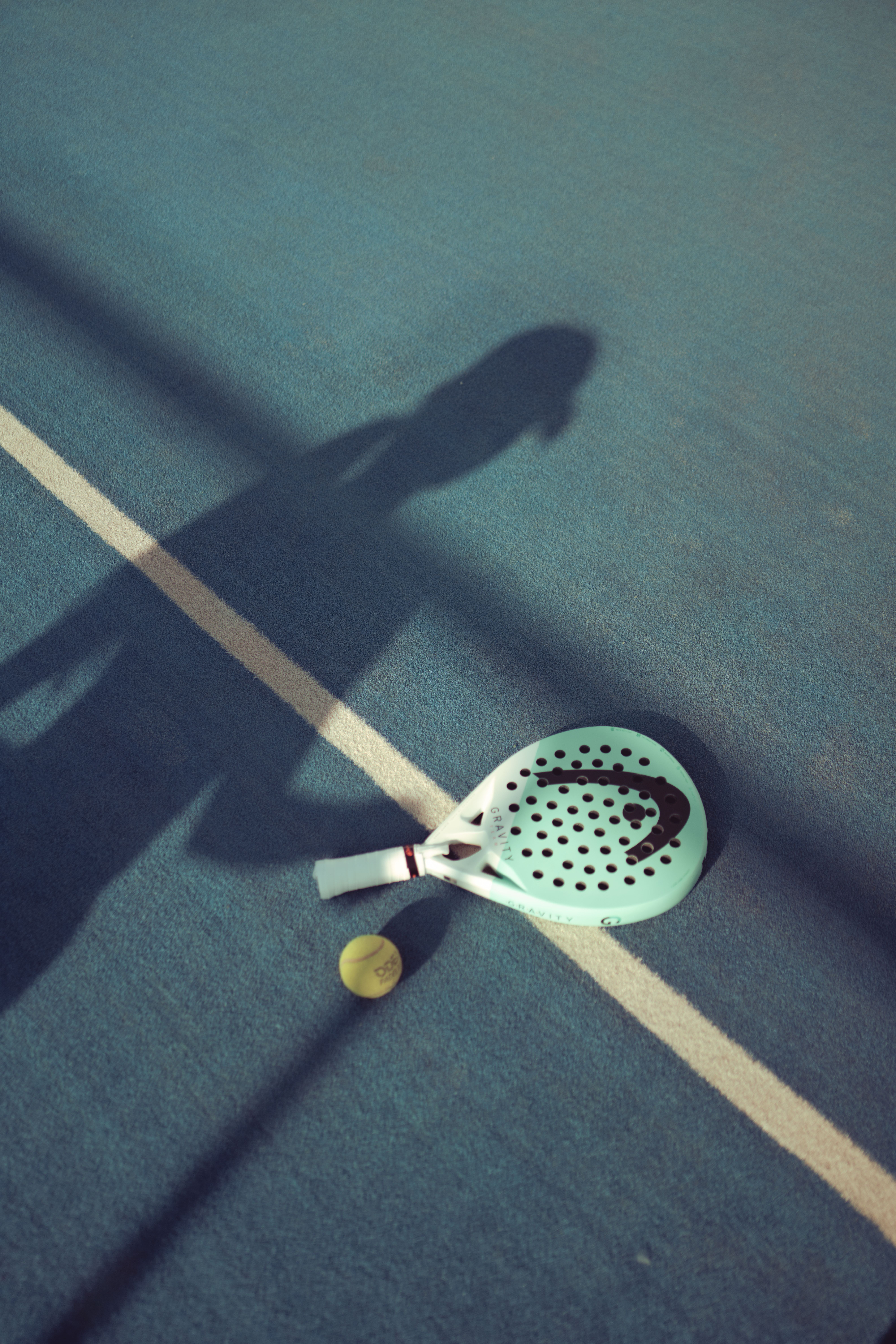 Padel Tennis Court Shadow with Racket · Free Stock Photo