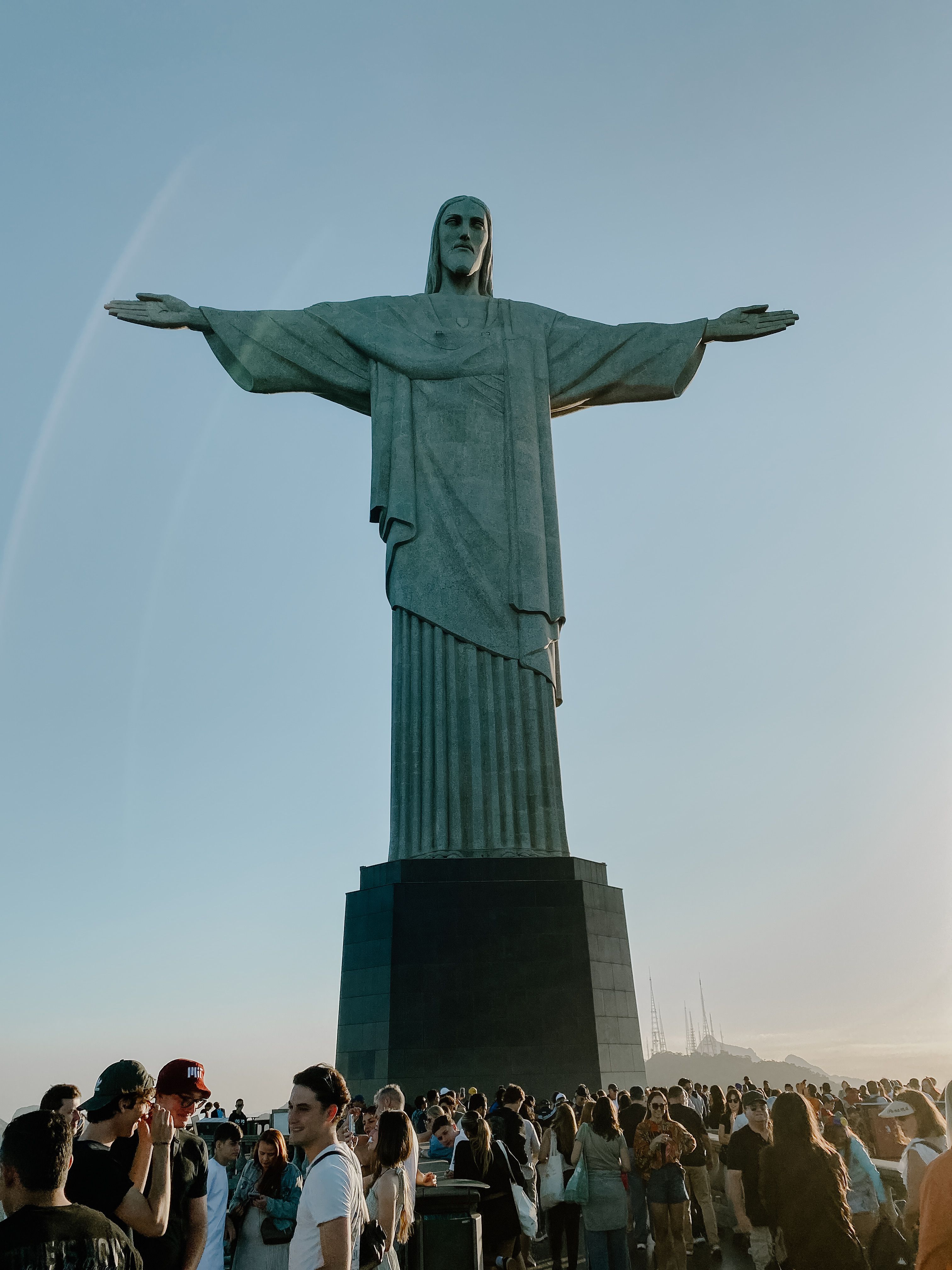 Iconic Christ the Redeemer with Crowds at Sunset · Free Stock Photo