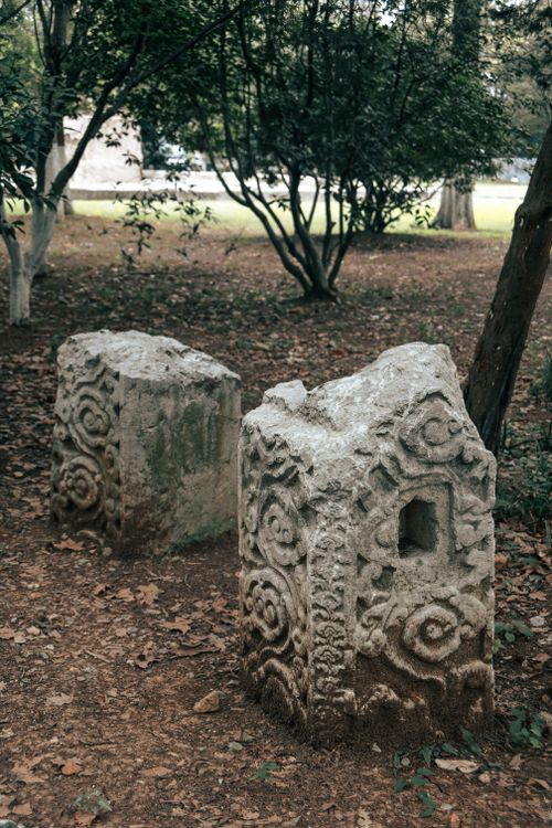 Free Explore intricate stone carvings in Nanjing's serene park setting, highlighting ancient artistry. Stock Photo