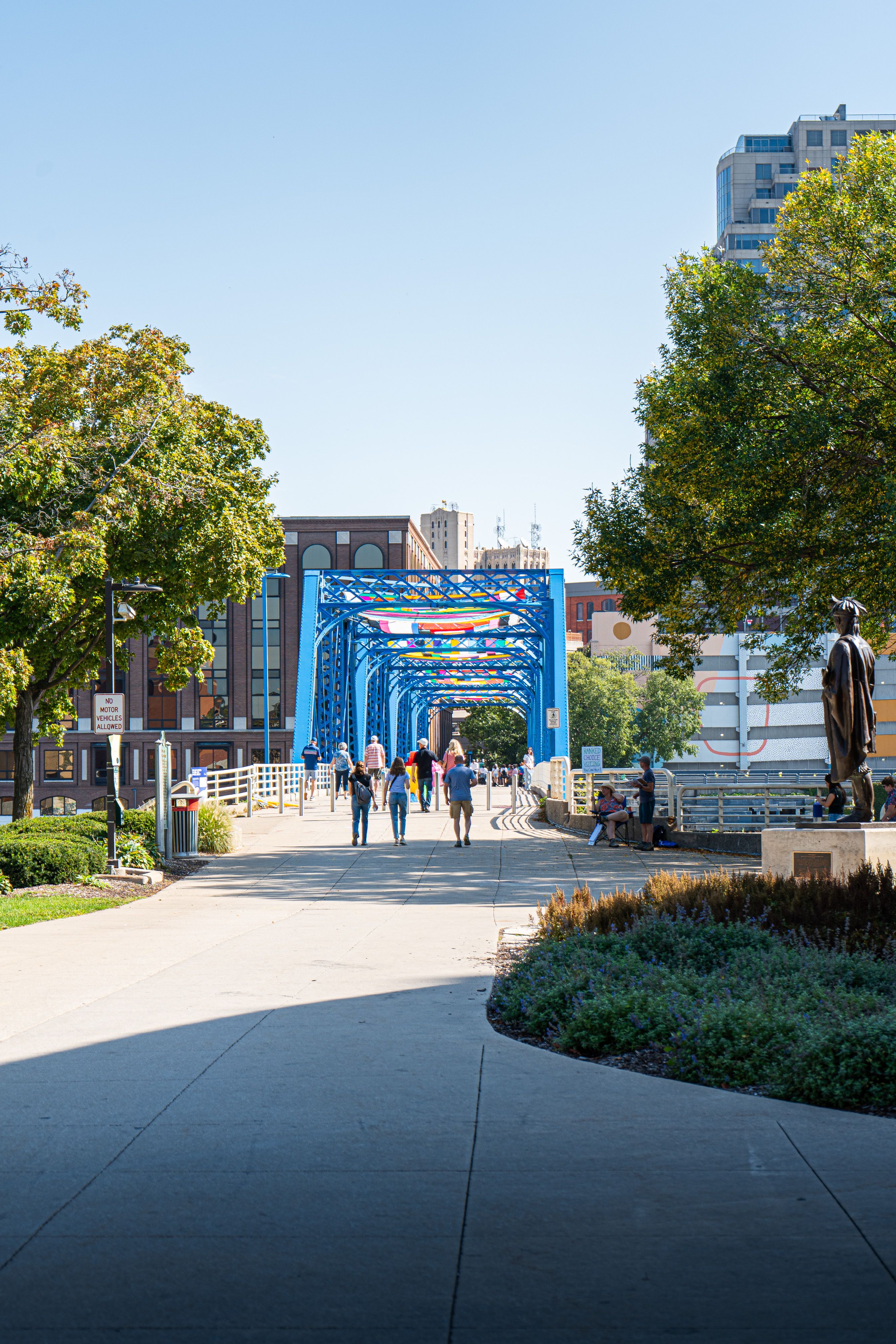 Colorful canopy on iconic Blue Bridge in Grand Rapids, Michigan, a downtown public art attraction.