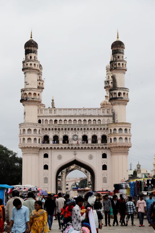 Free A vibrant market scene at the Charminar, Hyderabad showcasing local architecture. Stock Photo