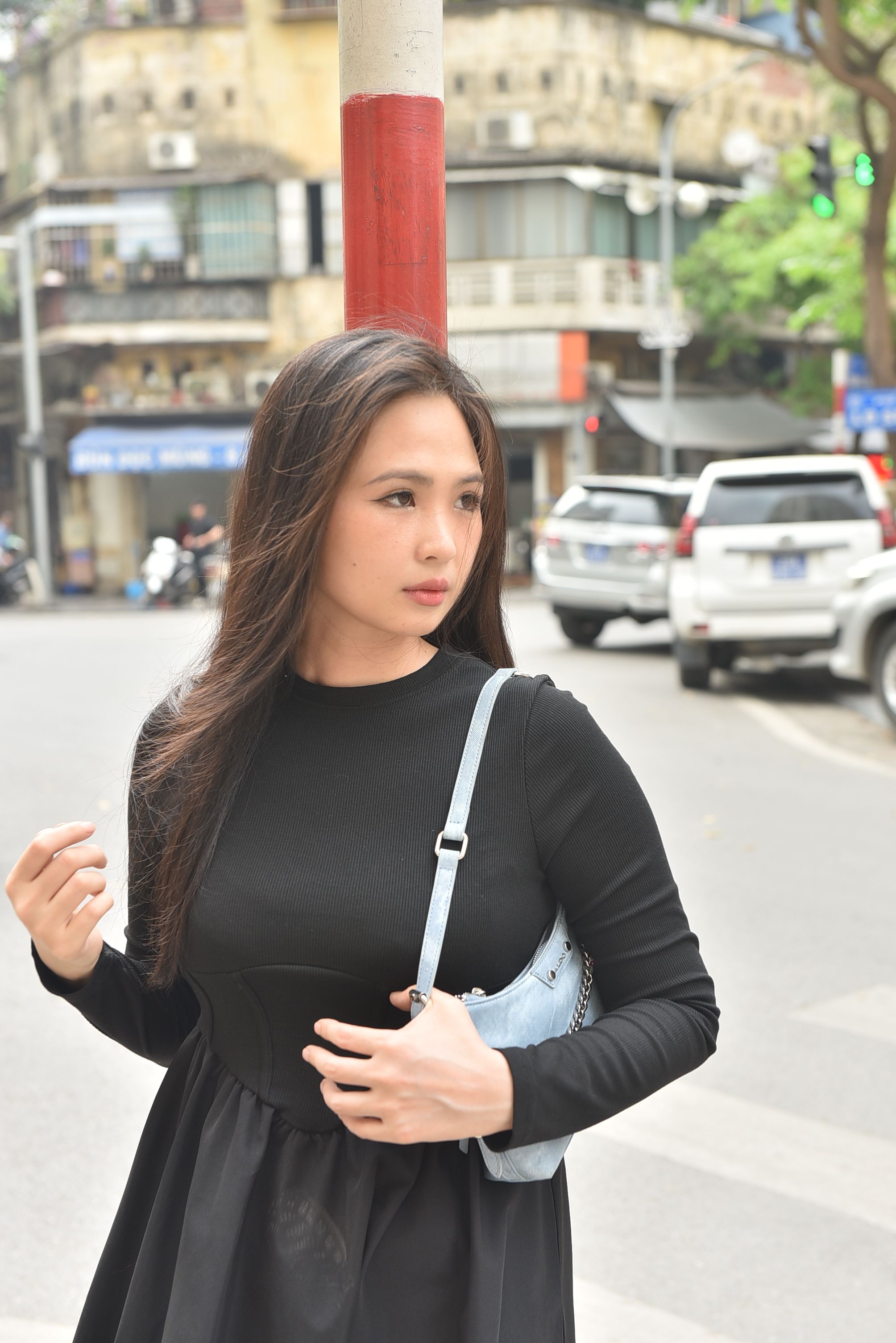 Stylish Young Woman Walking in Urban Street · Free Stock Photo