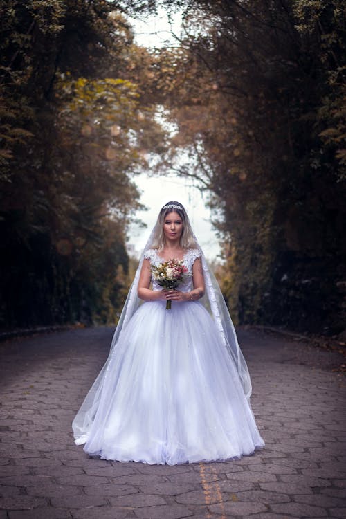 Photo Of Woman Wearing White Wedding Dress