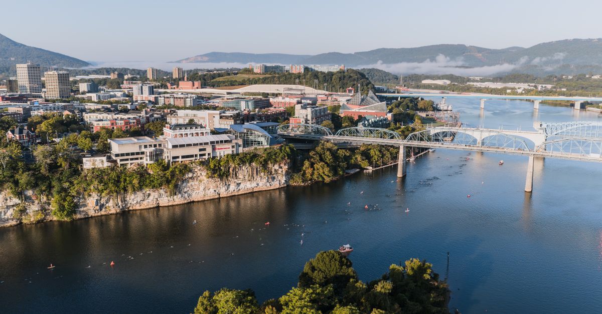 Stunning aerial shot of Chattanooga, Tennessee featuring iconic bridges and the Tennessee River.