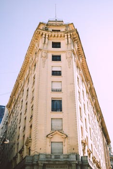 Classic Buenos Aires architecture showcasing ornate detailing against a clear sky.