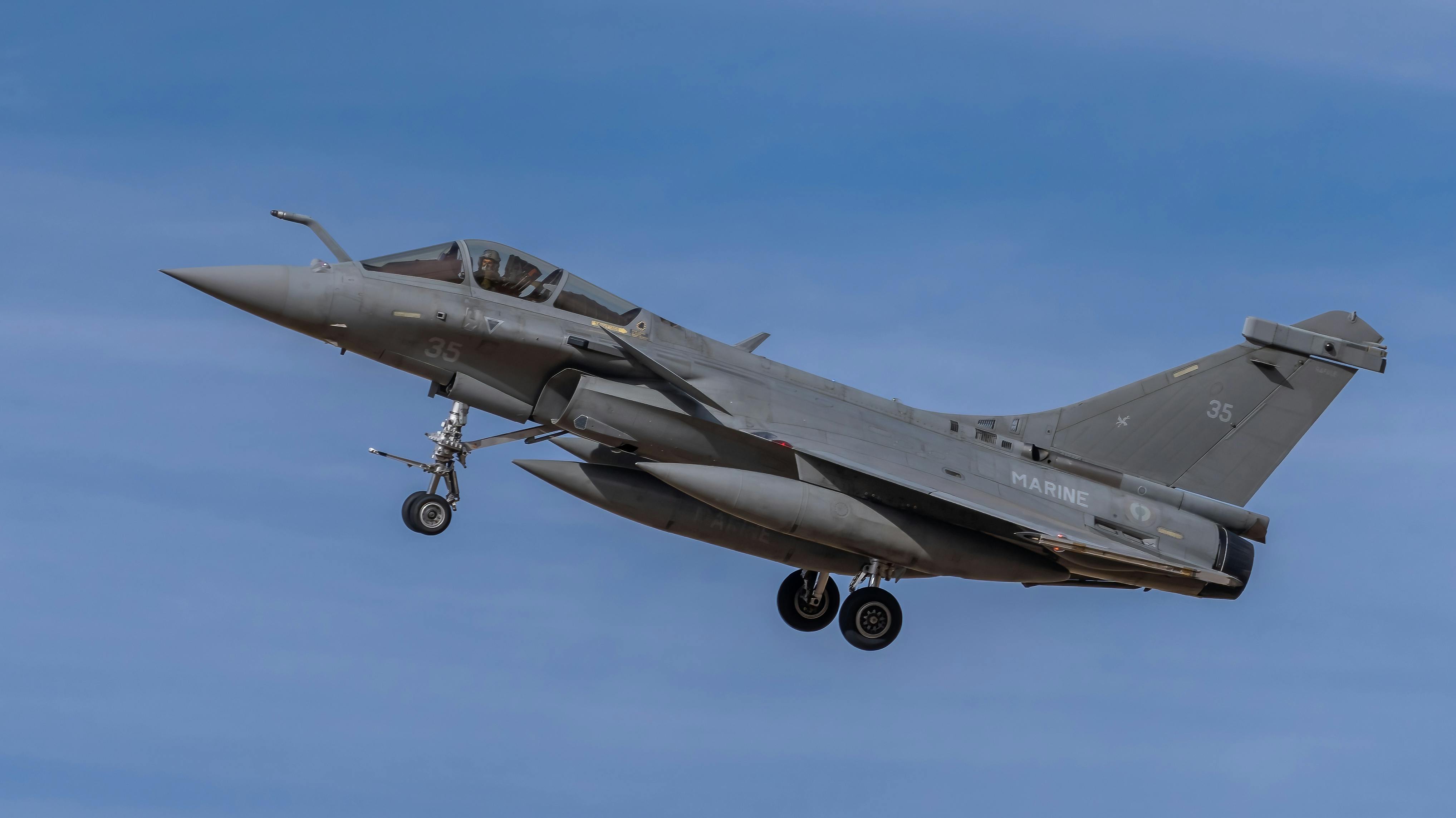 Free A Dassault Rafale Marine jet flying against a clear blue sky in Los Llanos. Stock Photo