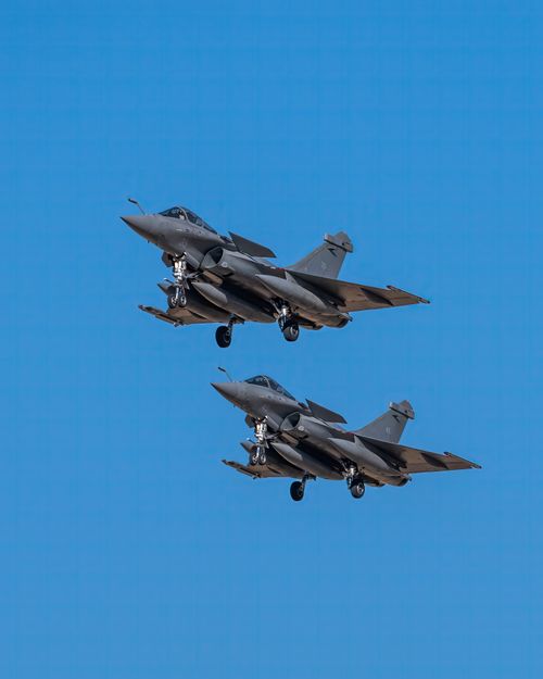 Dassault Rafale Blue Aerial Display of Dassault Rafale Jets Against Blue Sky · Free Stock Photo