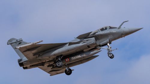 Free Dassault Rafale fighter jet flying at Los Llanos, showcasing its naval aviation capabilities. Stock Photo