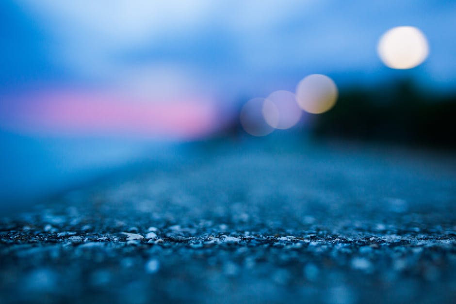 Shallow Focus Photography of Gray Asphalt Floor