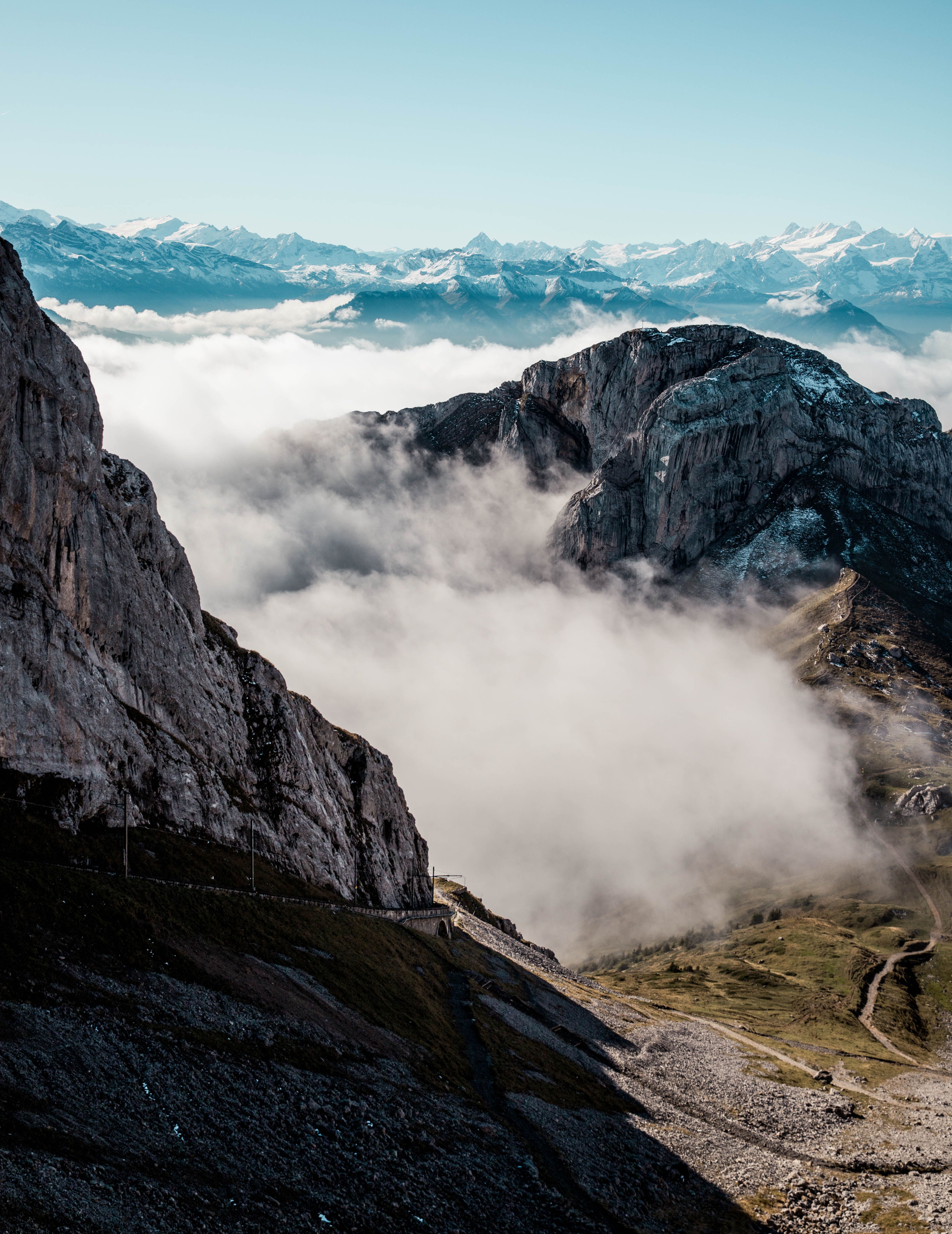 Majestic Swiss Alps with Misty Peaks · Free Stock Photo