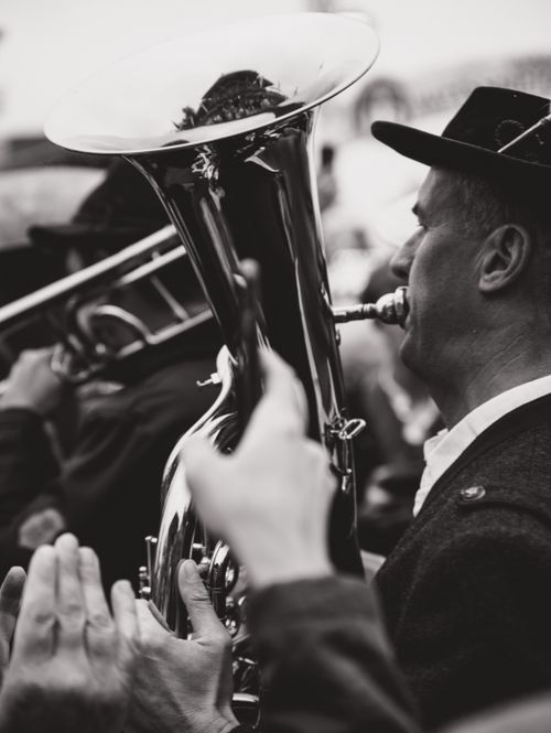 Free Black and white photo of a brass band performing outdoors in Munich, Bavaria. Stock Photo