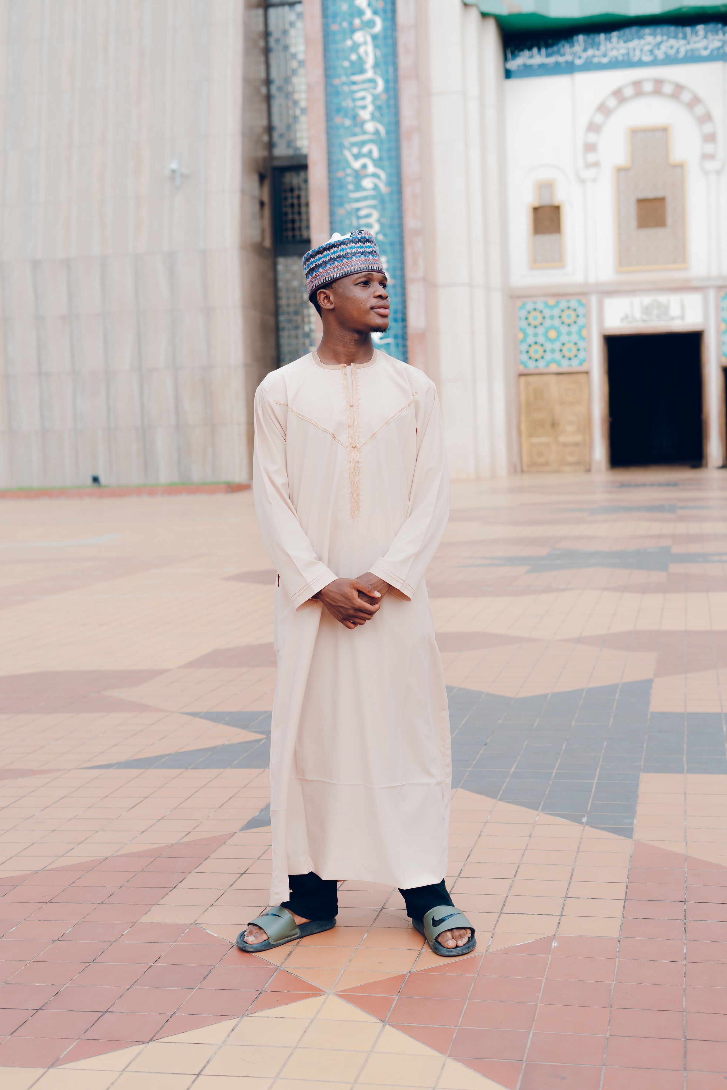 Portrait of Man in Traditional Attire at Mosque · Free Stock Photo