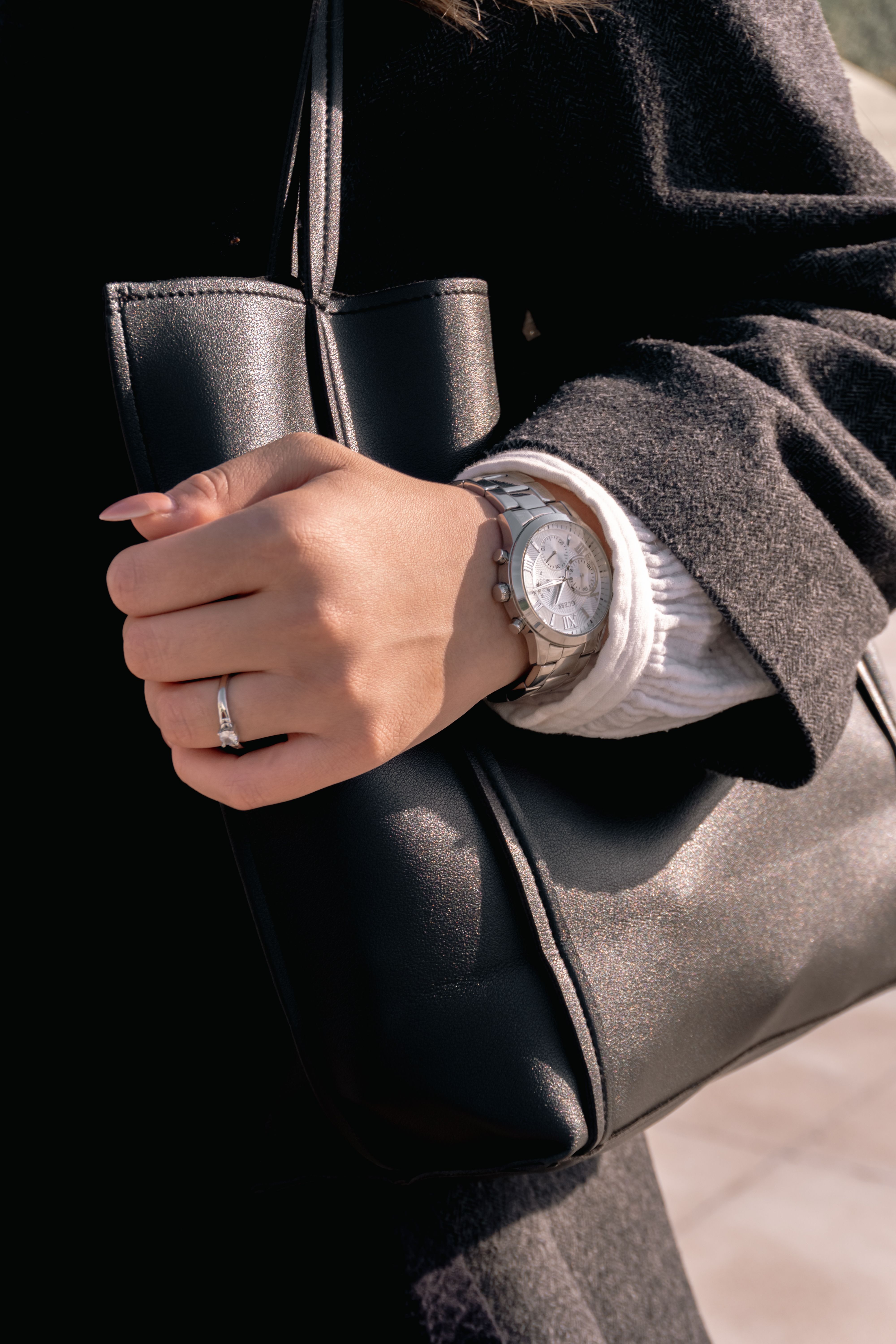 Woman in Black Jacket with Thinning Buffeted Sleeve · Free Stock Photo