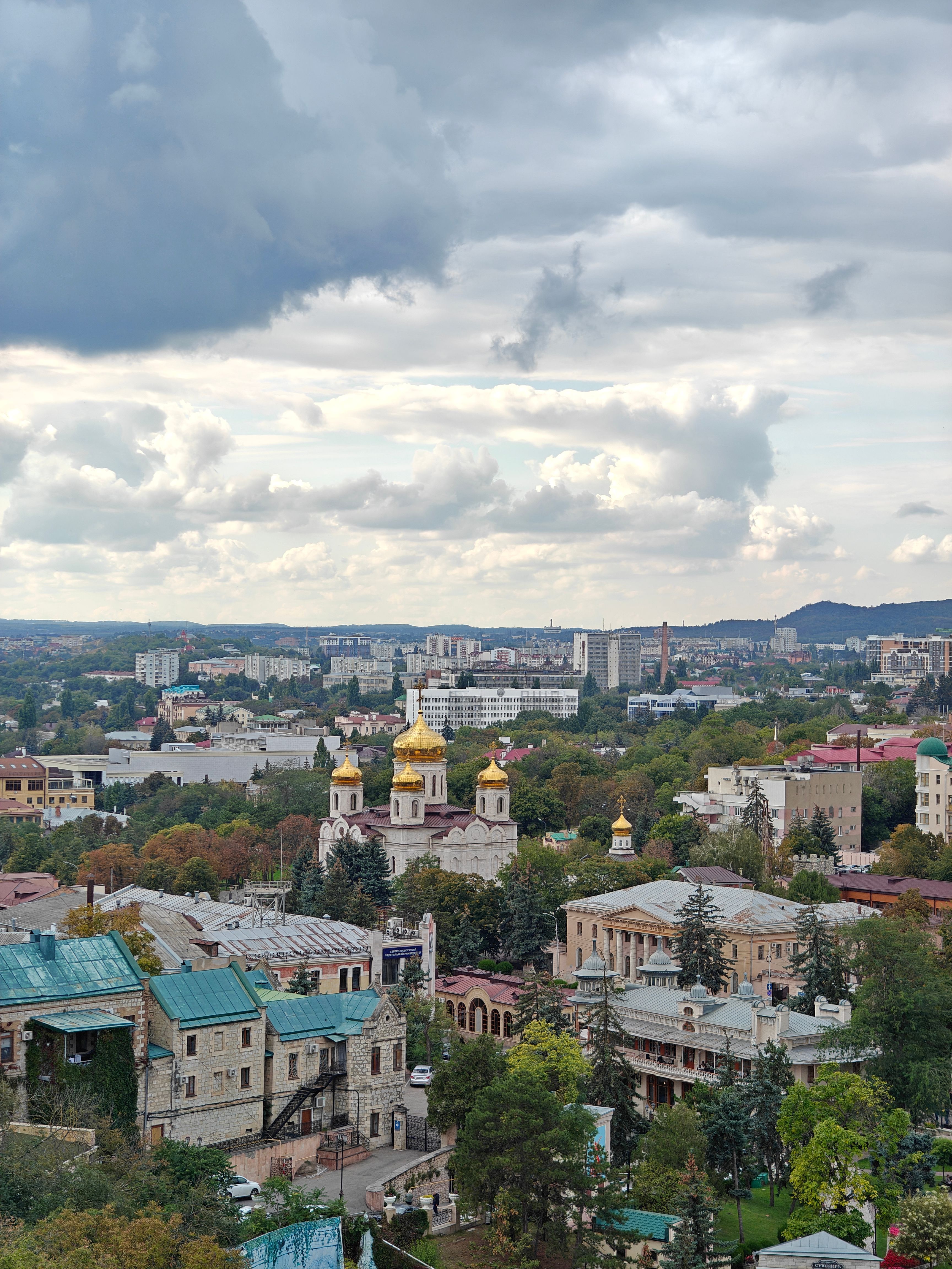 Aerial view of Rostov-on-Don featuring Saint Vladimir Cathedral under cloudy skies.