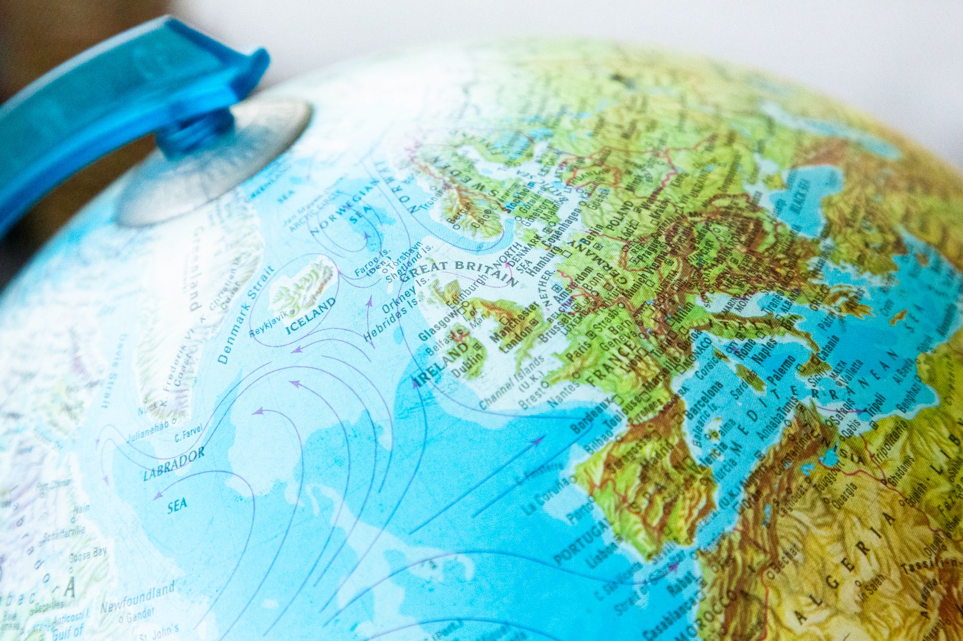Detailed view of a world globe focusing on Europe and surrounding regions.