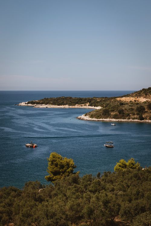 Free Discover the stunning turquoise waters and coastlines of Ksamil, Albania. Stock Photo