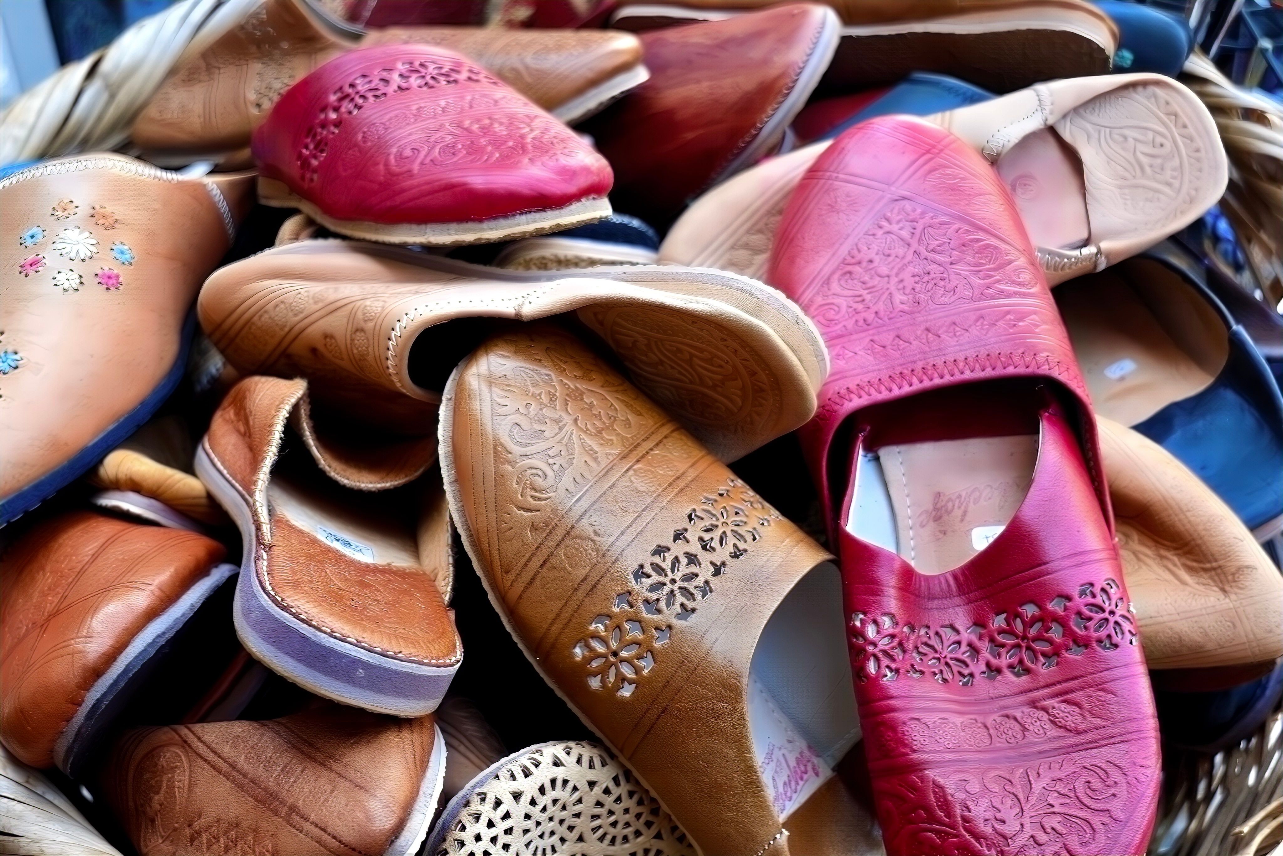 Traditional handmade Serbian opanak leather footwear displayed at a craft stall