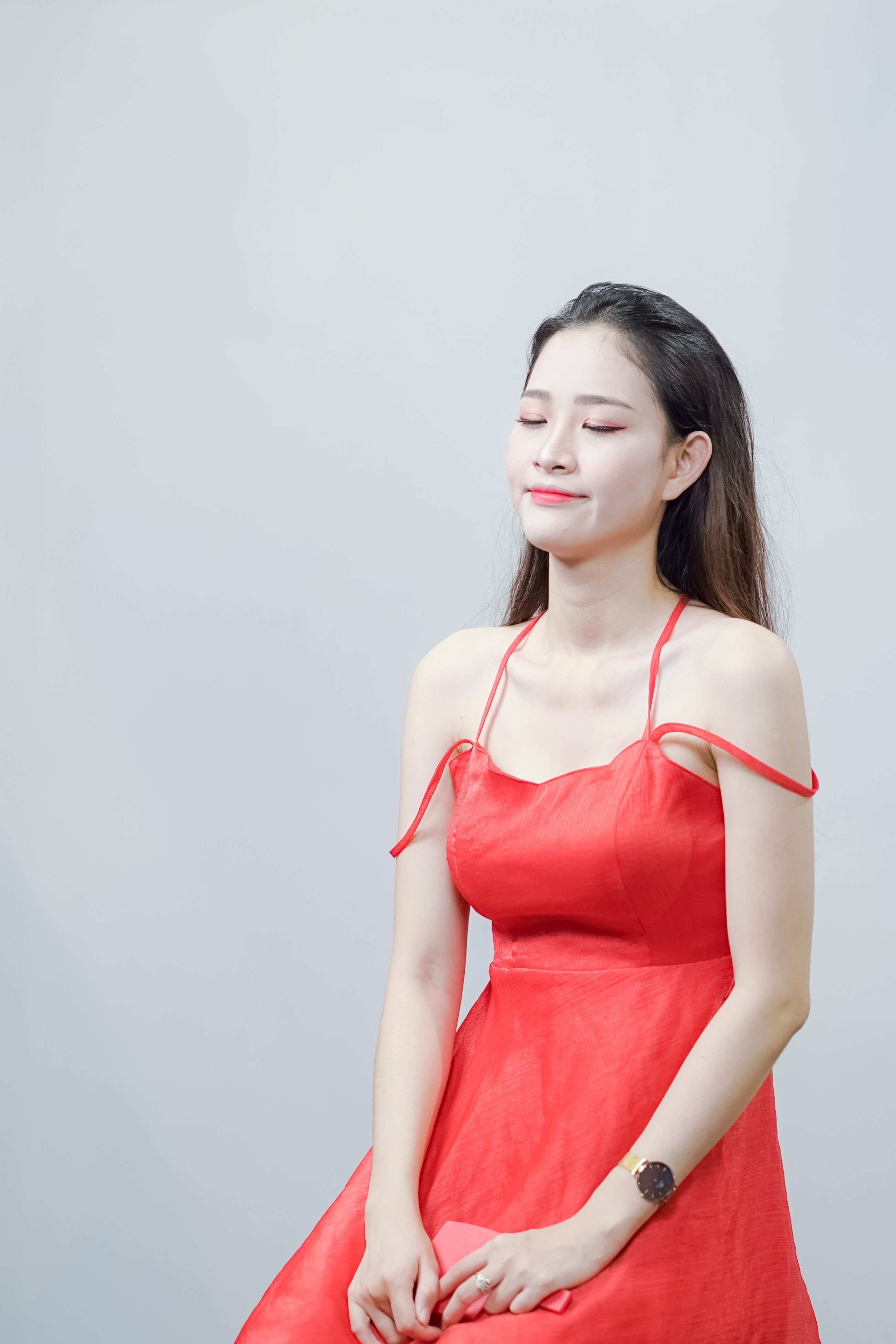 Woman in Pink Dress Sitting on Chair · Free Stock Photo