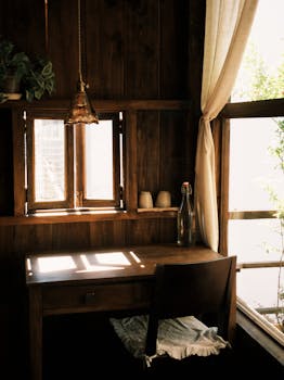 Charming rustic room with wooden desk and natural lighting.