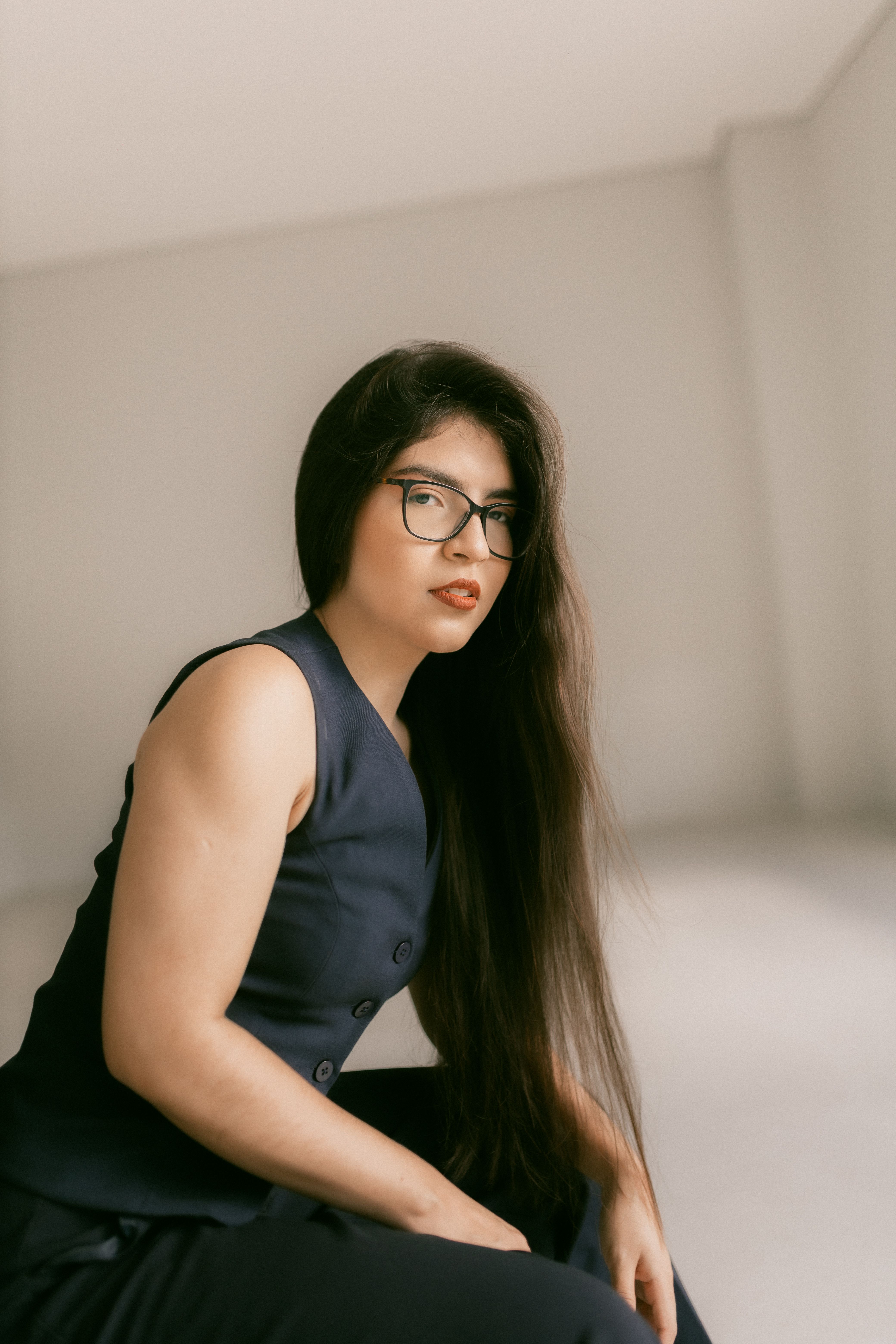 Portrait of a Stylish Woman in Elegant Attire · Free Stock Photo