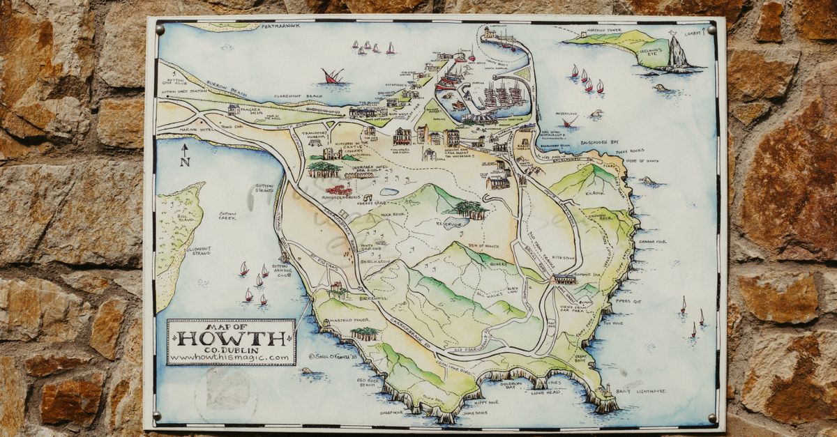 Howth Loop Map Map of Howth on Stone Wall in Dublin, Ireland · Free Stock Photo