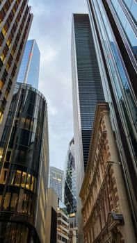 View of iconic skyscrapers in London's financial district with modern architecture elements.