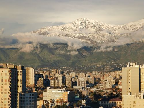 Free A stunning view of Santiago's skyline with the Andes Mountains in the background. Stock Photo