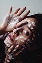 Woman With White Paint on Face