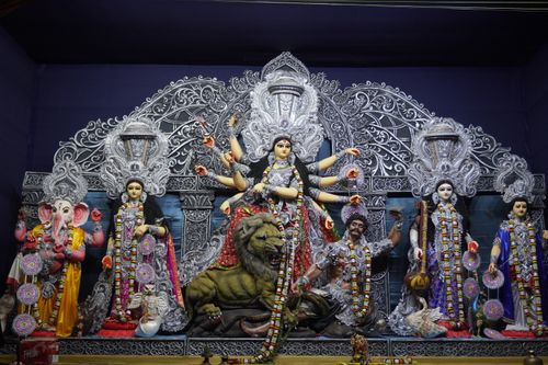 Free Vibrant statues of Hindu deities displayed during the Durga Puja festival. Stock Photo