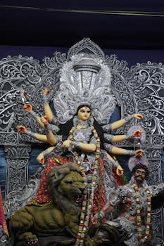 Detailed statue of Goddess Durga with a lion, celebrating Durga Puja.