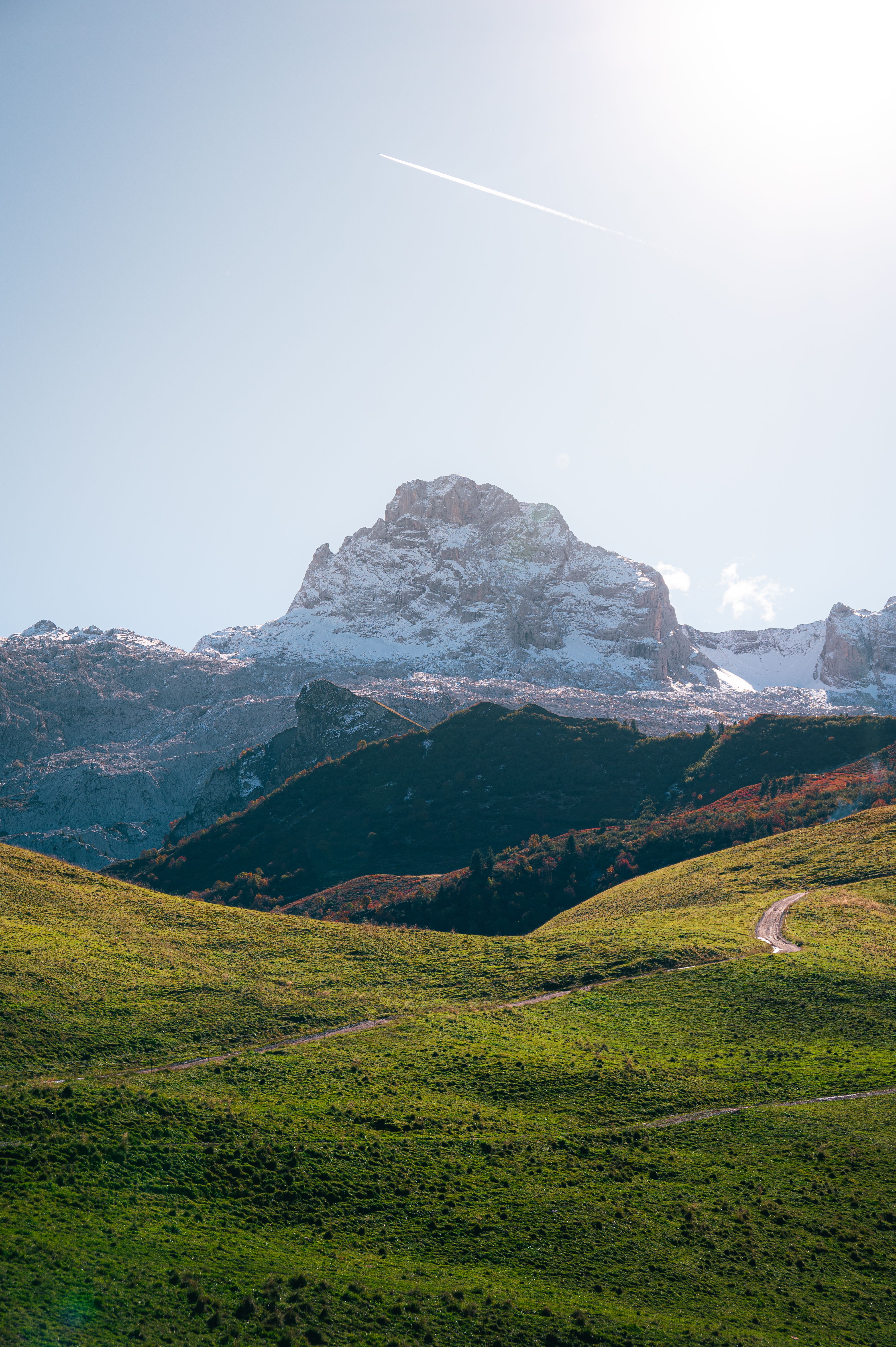 Stunning landscape of Le Grand-Bornand showing vibrant meadows and snow-capped mountains.