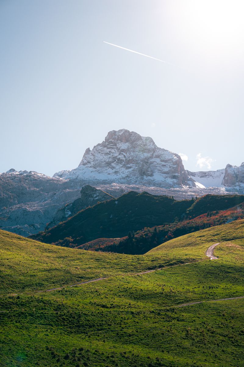 Stunning landscape of Le Grand-Bornand showing vibrant meadows and snow-capped mountains.