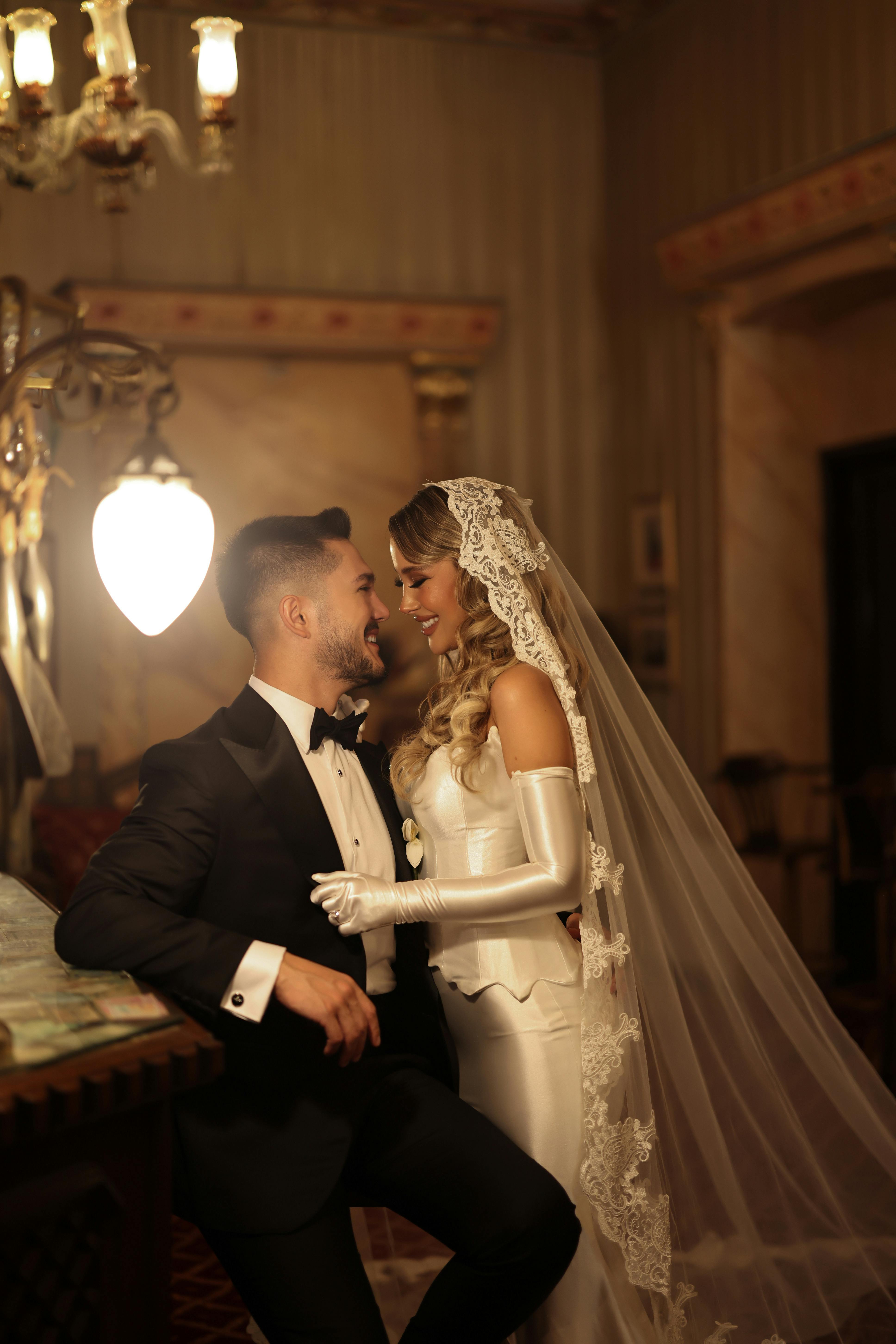 Elegant couple celebrating their wedding in an opulent Istanbul venue, capturing timeless romance.