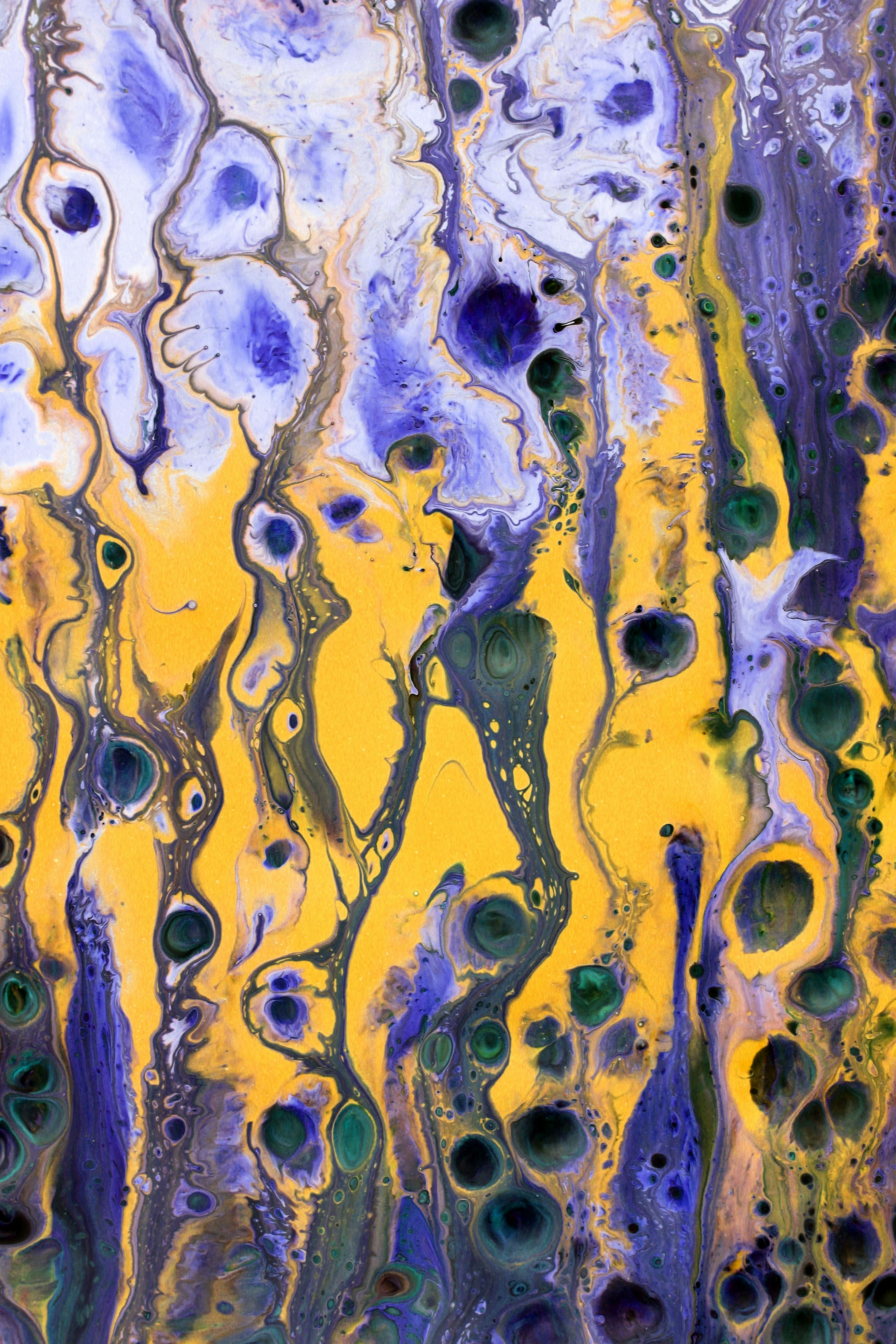 Free Colorful abstract painting featuring purple, yellow, and green swirls and patterns. Stock Photo