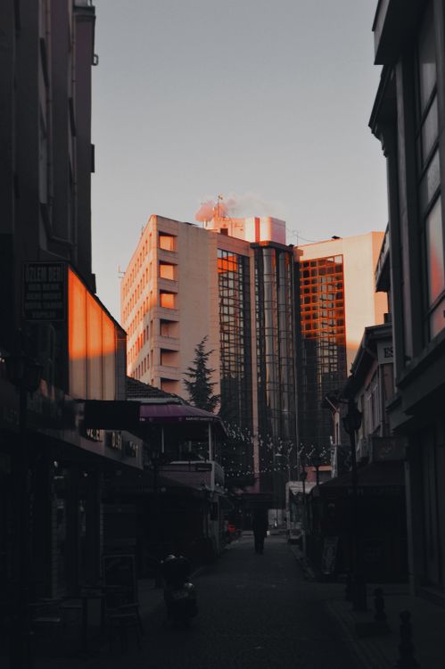 Free A captivating view of Eskişehir's cityscape with buildings glowing in the sunset. Stock Photo