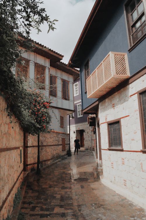 Free Explore a quaint stone alley in Antalya's historic district, featuring traditional architecture. Stock Photo