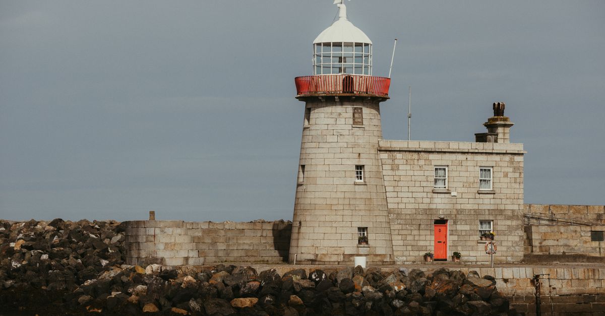Iconic Howth Harbour Lighthouse in Dublin, Ireland · Free Stock Photo