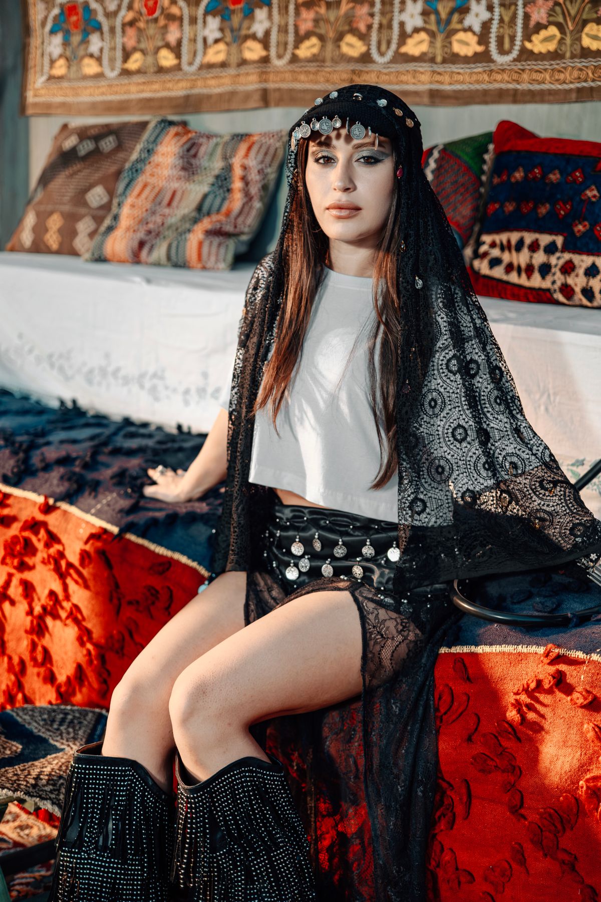 Young woman in styled outfit with textured fabrics