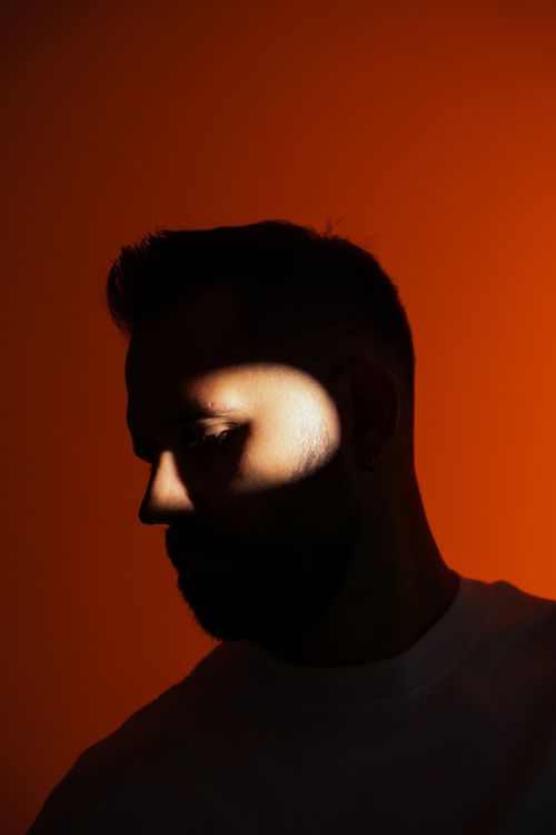 Dramatic Shadows Portrait Dramatic Shadow Portrait with Bold Lighting · Free Stock Photo