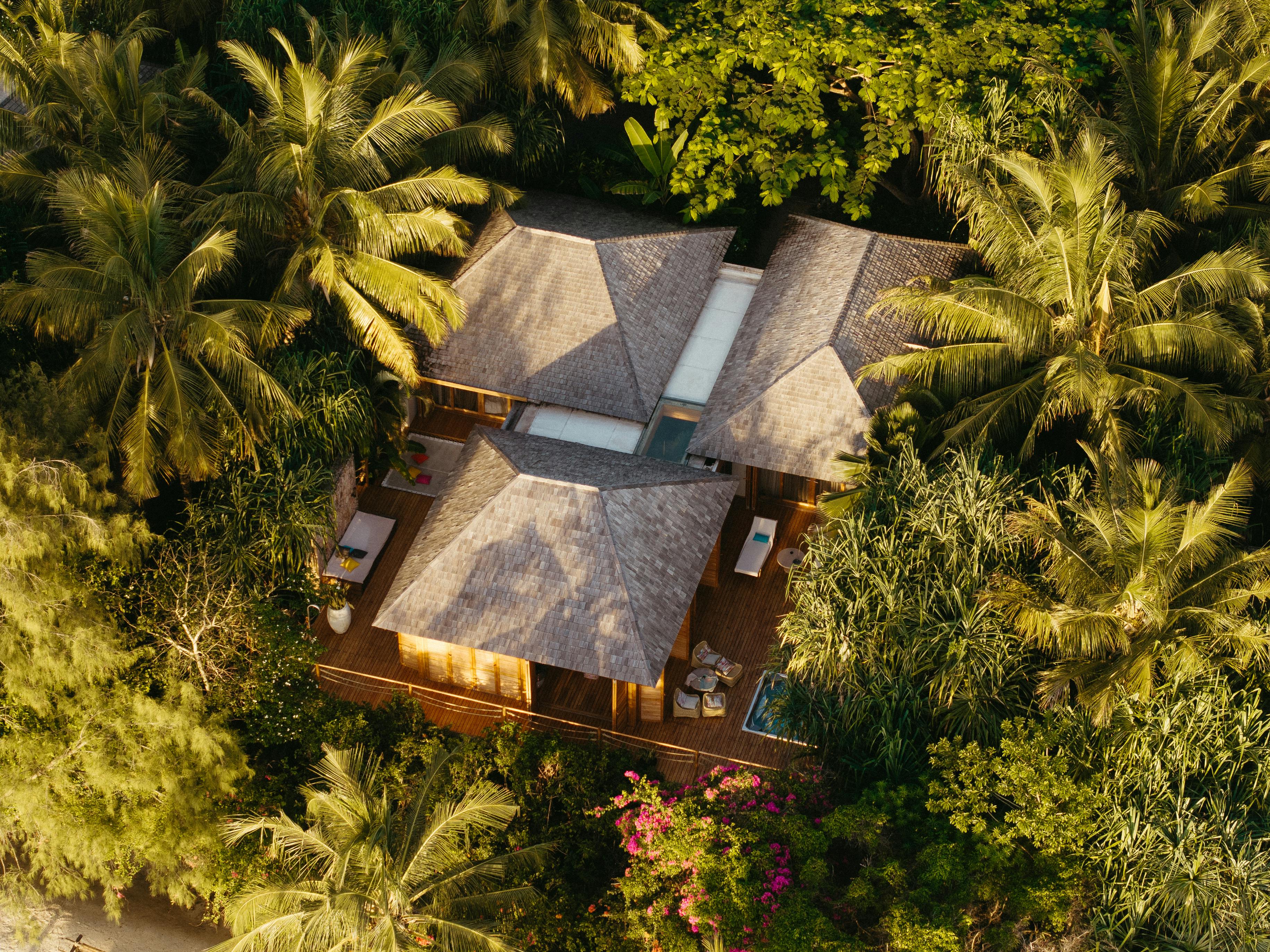 Discover tranquility in a luxury villa surrounded by lush greenery in Zanzibar.