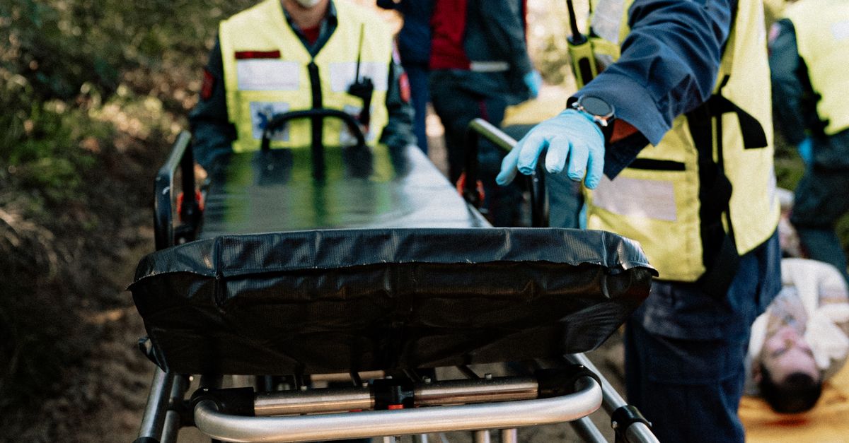 Health Rescuer Emergency Medical Simulation with Rescue Team Outdoors · Free Stock Photo