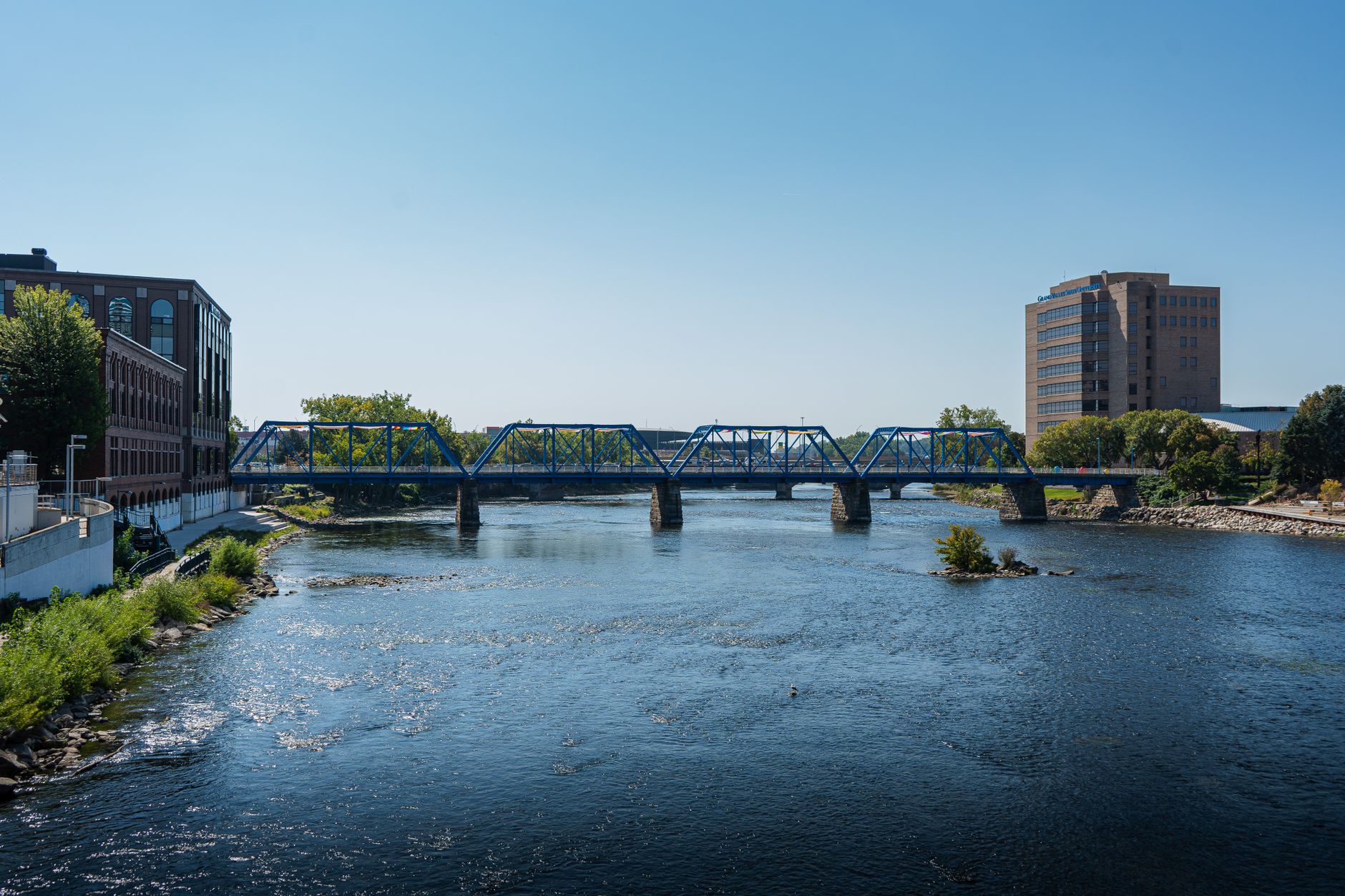 Scenic view of the iconic Blue Bridge crossing the river in Grand Rapids, Michigan.