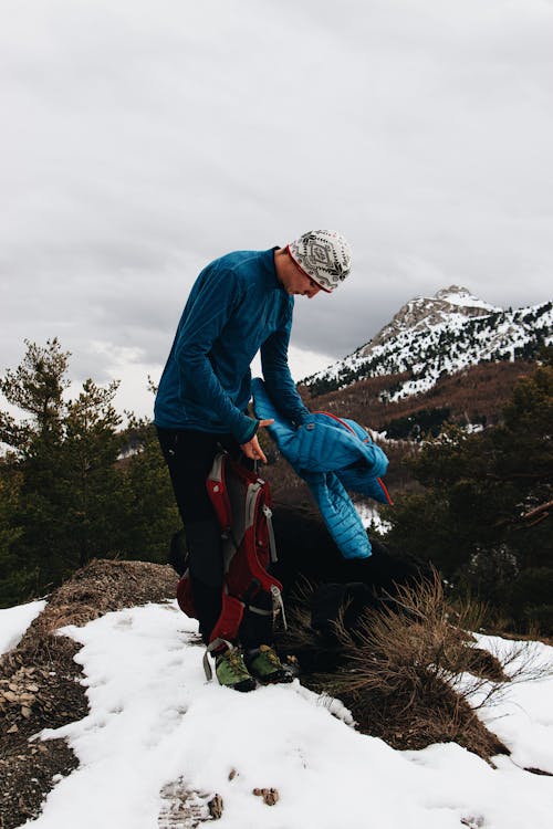 Man Wearing Blue Crew-neck Sweater