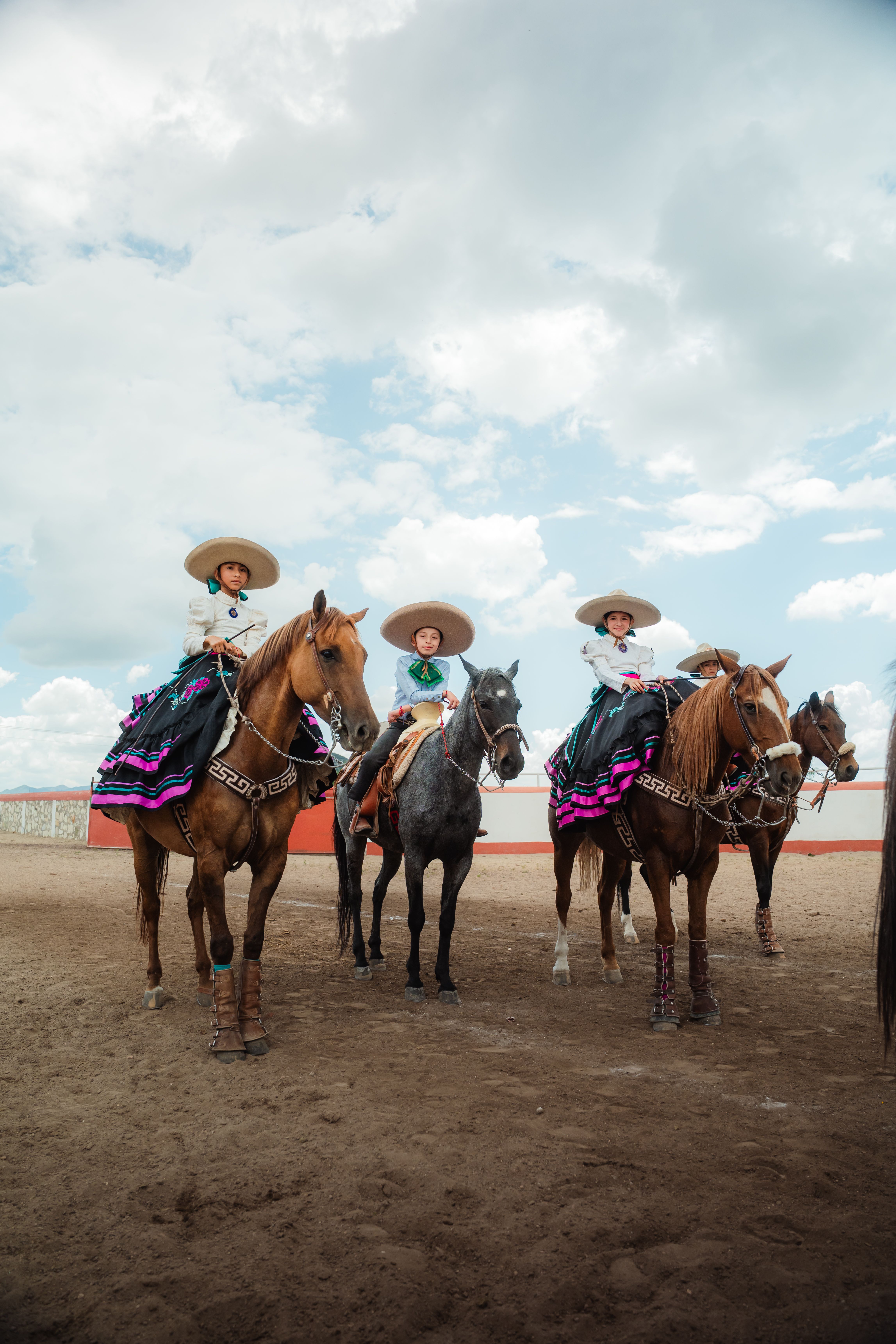 Mexican Charro Riders in Traditional Attire · Free Stock Photo