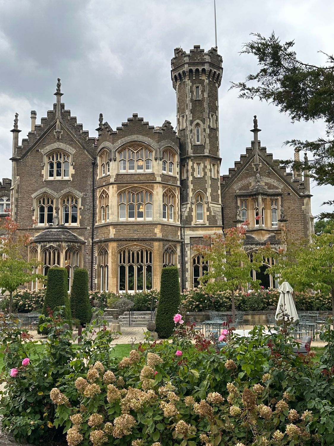Gothic Revival Castle with Lush Gardens · Free Stock Photo