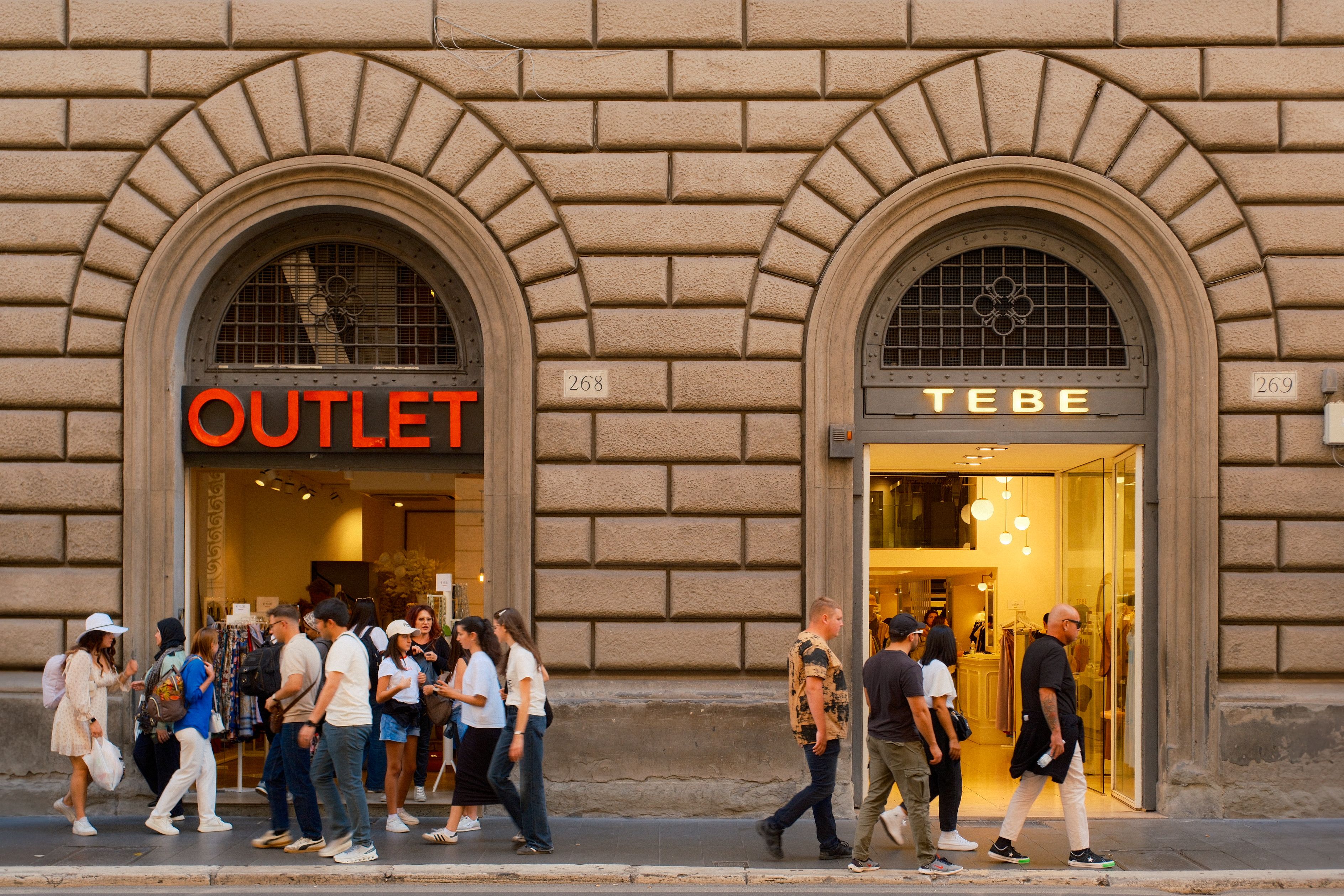 Busy Shopping Scene Outside Florence Outlets · Free Stock Photo
